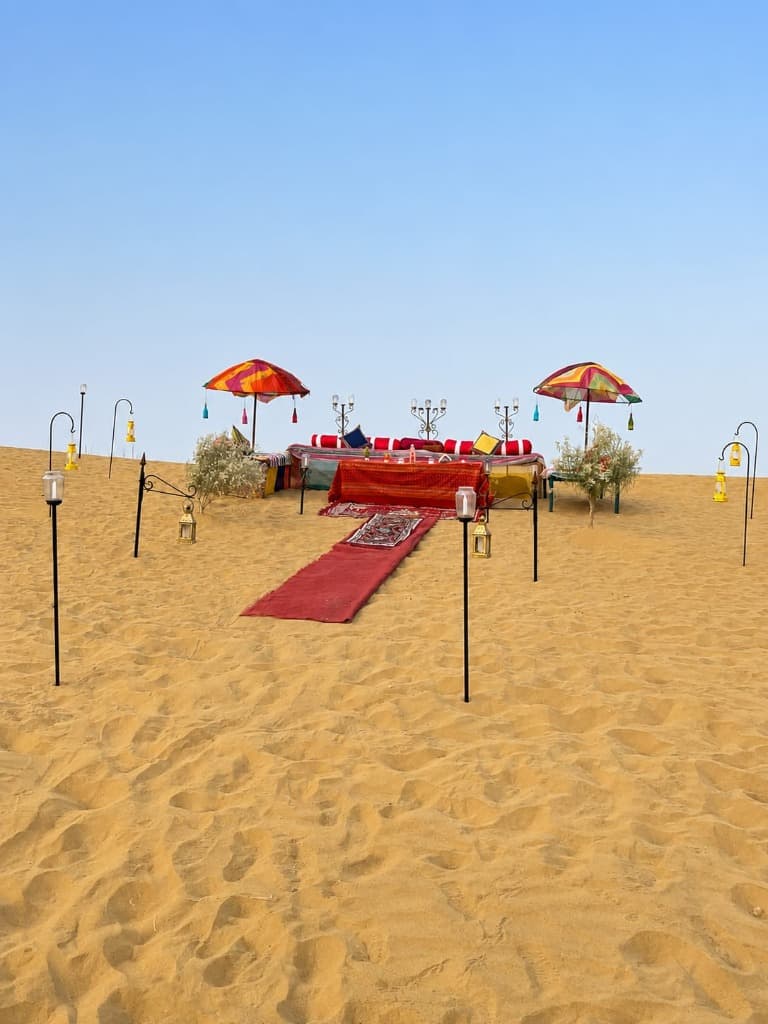 Private Dune Dining setup at sunset